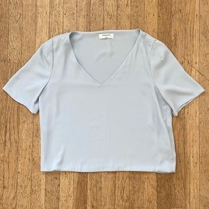 Babaton Aritzia top in light blue short sleeve